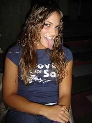 Here's a look at the curly-haired curly-tongued bimbette