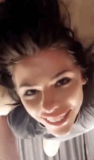 Ball tapping the nose as she deepthroats a long white cock