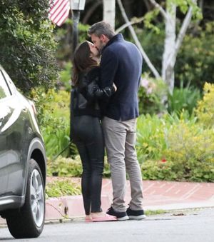 Ben Affleck and Ana de Armas out for a walk seen by paparazzi kissing.