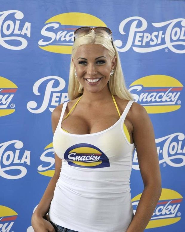 Her Tanktop Can Barely Hold This Busty Blonde Bombshell's Boobs