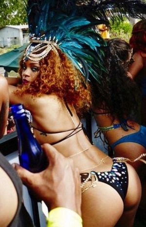 Rihanna daring you to fuck her. Any man who tries can do what they want to her Caribbean Goddess body. Discuss below how you’d ruin her