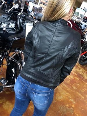 An ex showing me her ass as she tried on a biker jacket