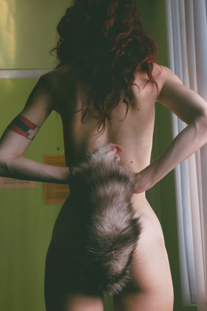 Redhead with Tail