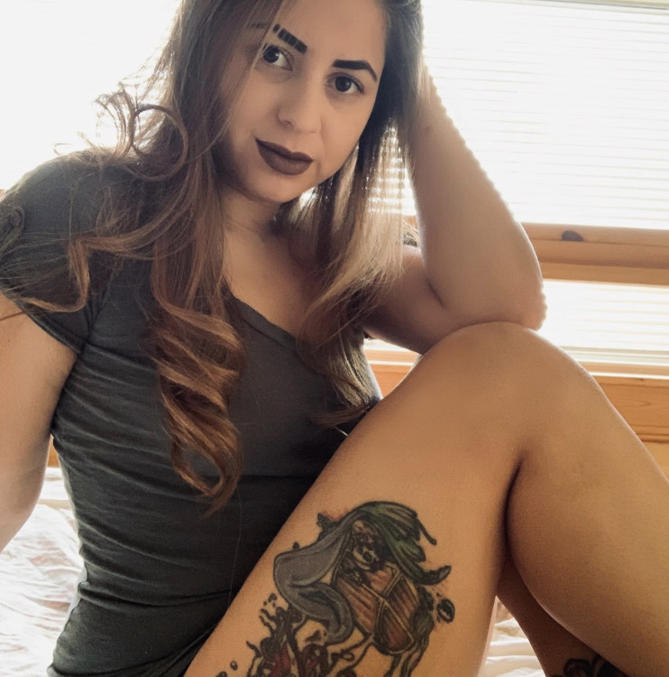 She’s been sending photos trying to convince my girlfriend, her mom, and I
