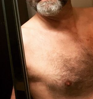 Hairy muscle bear bottom with a thick cock.