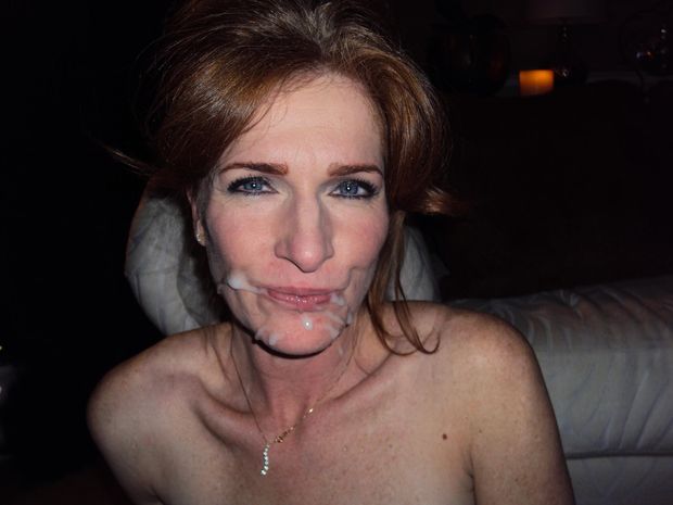Hot amateur MILF licks the cum from her lips after a blowjob