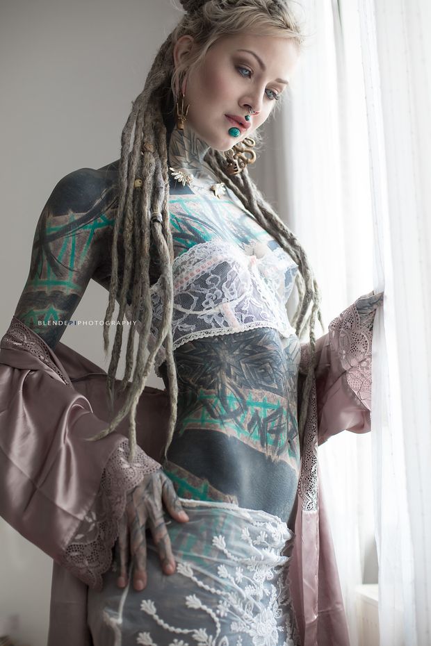 Heavily tattooed hottie