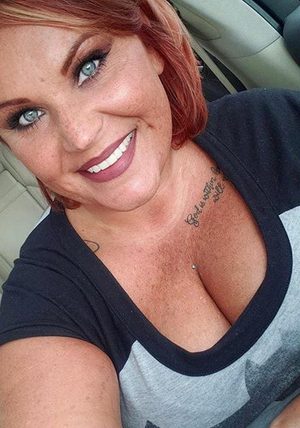 redhead big milf cleavage