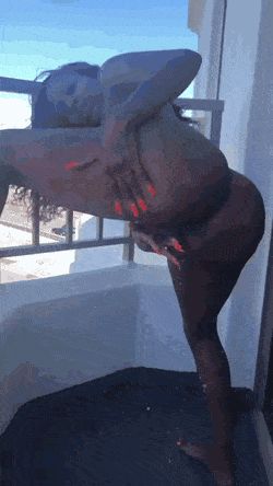Black lady Squirting All Over The Balcony