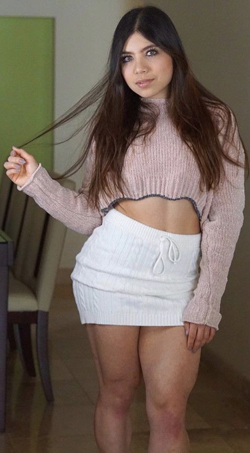 Slide my hands up her legs and caress what’s underneath that skirt. And then explore the hidden hills and finally proceed to skull fuck her