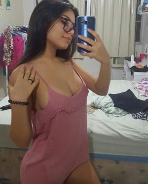 Latina Woman with Big Boobs and Glasses