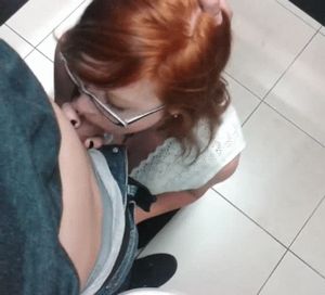 Redhead sucking cock
