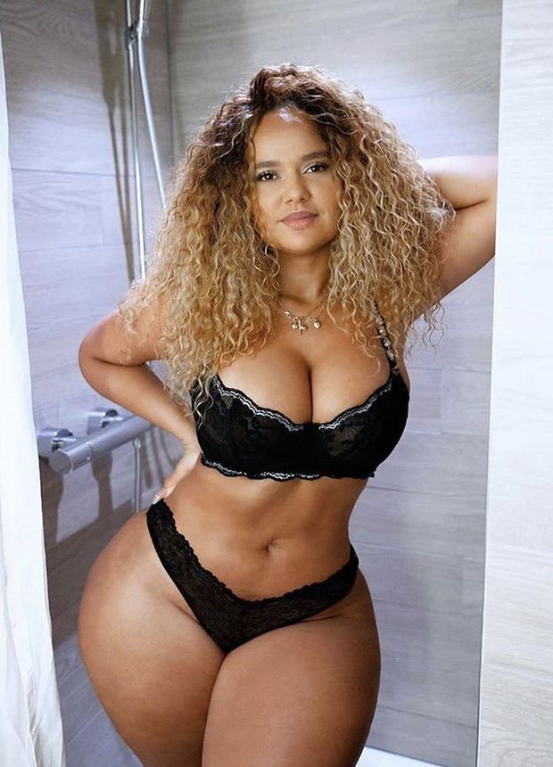 Perfect curly haired ebony woman