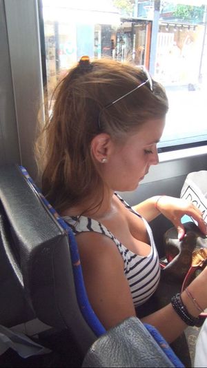 Down her blouse on the bus