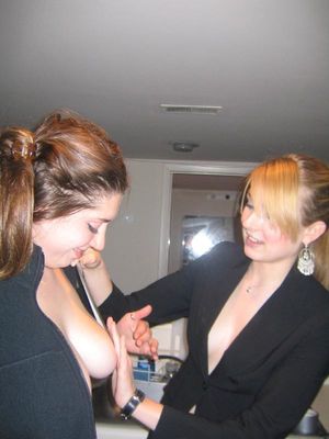 Blonde gropes brunette's tits