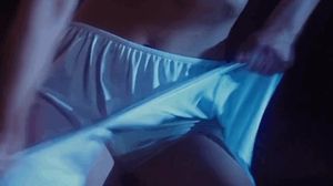 Emma Watson tearing away her night gown