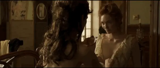 Keira Knightley undoing curious Victorian era woman’s dress
