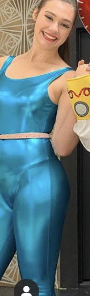 Sexy brunette in tight halloween costume