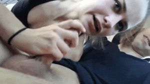 Blonde giving lucky guy a handjob