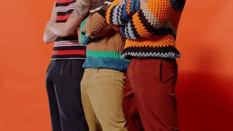 Three erections trying to escape colorful pants