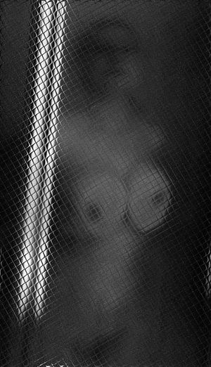 Pressing breasts against the shower glass