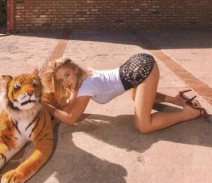 Sydney bent over in mini skirt