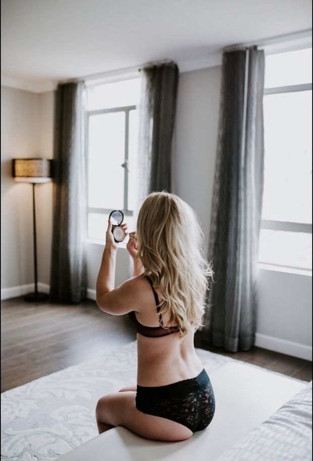 Blonde wife getting ready for her date