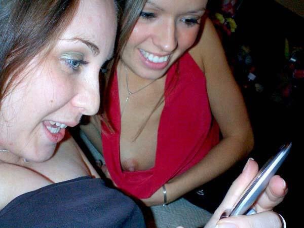 Let's hear it for camera-phones. Great for downblouse pics and great distractors. Win-win.
