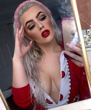 Busty bimbo in onesie