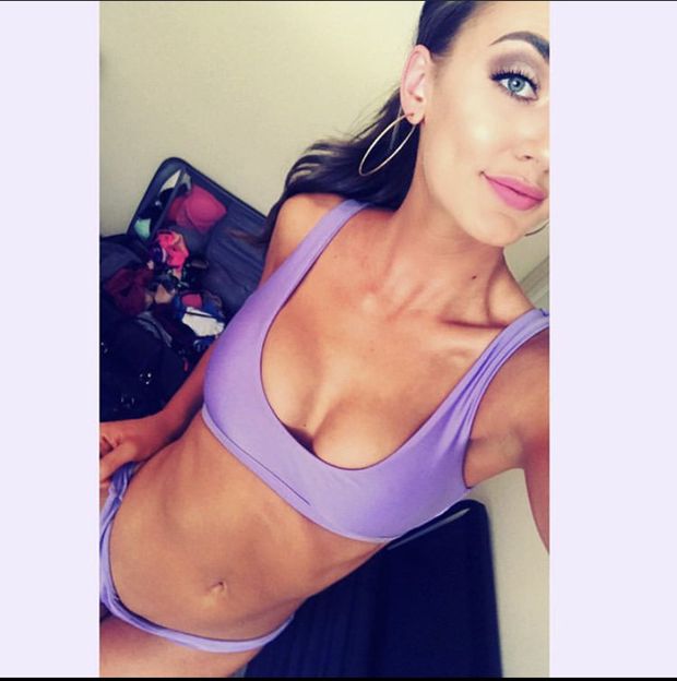 Kaytee is looking sexy as hell in purple athletic wear