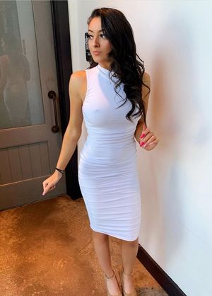 Brunette Maggie in tight dress
