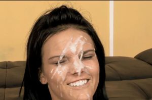 A nice brunette's face is enhanced with cum makeup