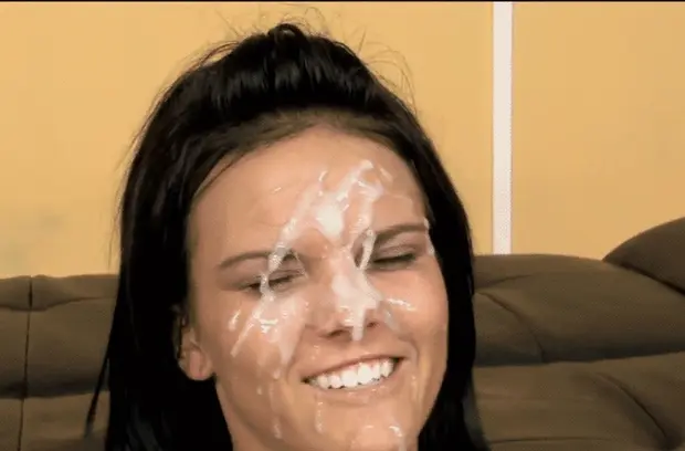 A nice brunette's face is enhanced with cum makeup