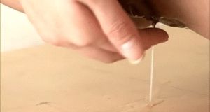 Asian playing with her pussy grool