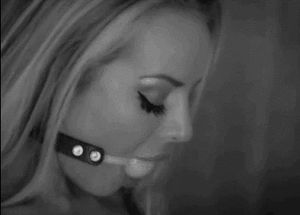 Sexy blonde ball gag