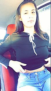 Cute teen showing boobs in a car