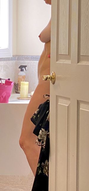 Caught the wife getting ready and her nipple playing peek a boo