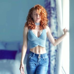 Redhead in blue croptop