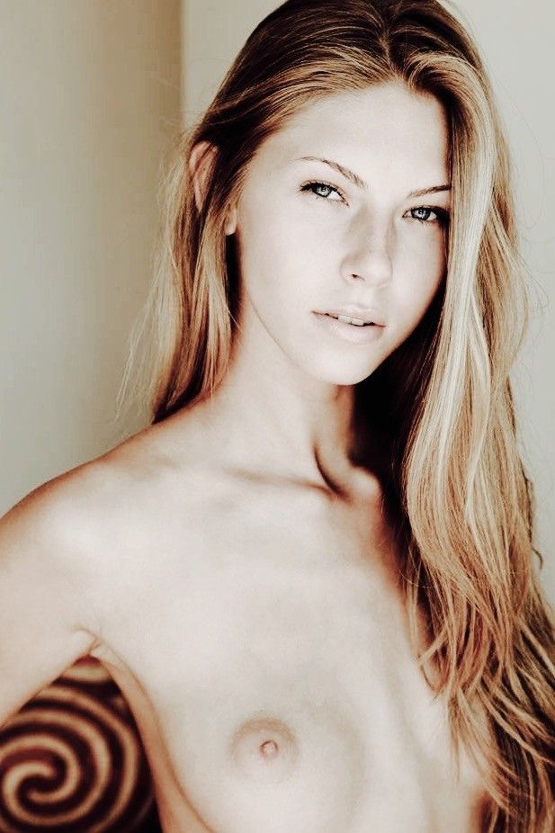 Slim Teen Blonde Exposes her pert boobs