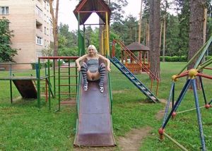 Teen slut plays naked in the public playground