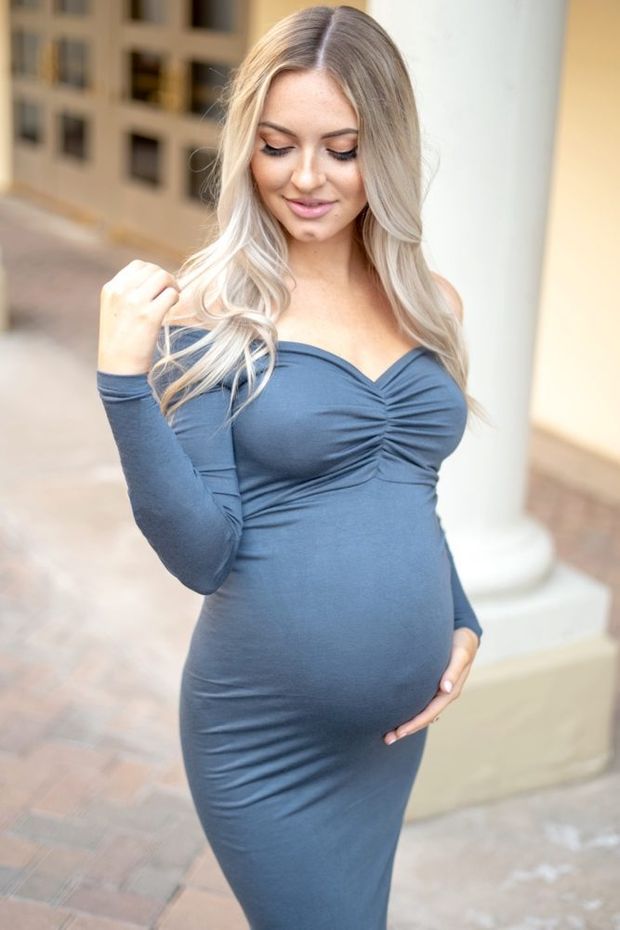 Pregnant In A Blue Dress