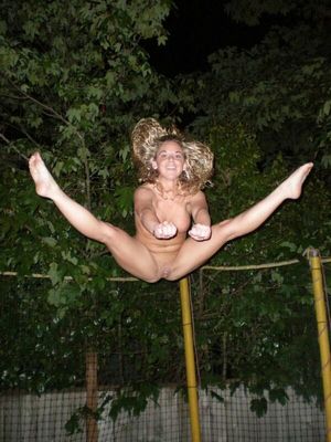 Naked blonde on trampoline