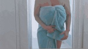 Dropping Towel And Shaking Big Tits