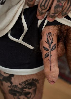 Uncut penis tattoed