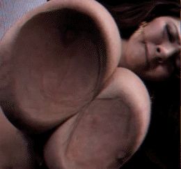 Hitomi Tanaka pressing the wonderful titties