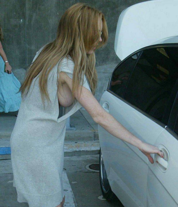 Lindsay Lohan sideboob getting into car