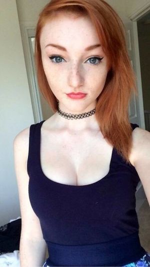 Cute little redhead teen