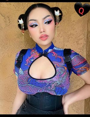 Dumb chick in traditional Chinese dress