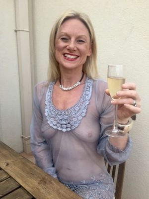 Mature Sitting with Wine