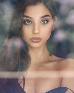 Maja Strojek sliding her bra off